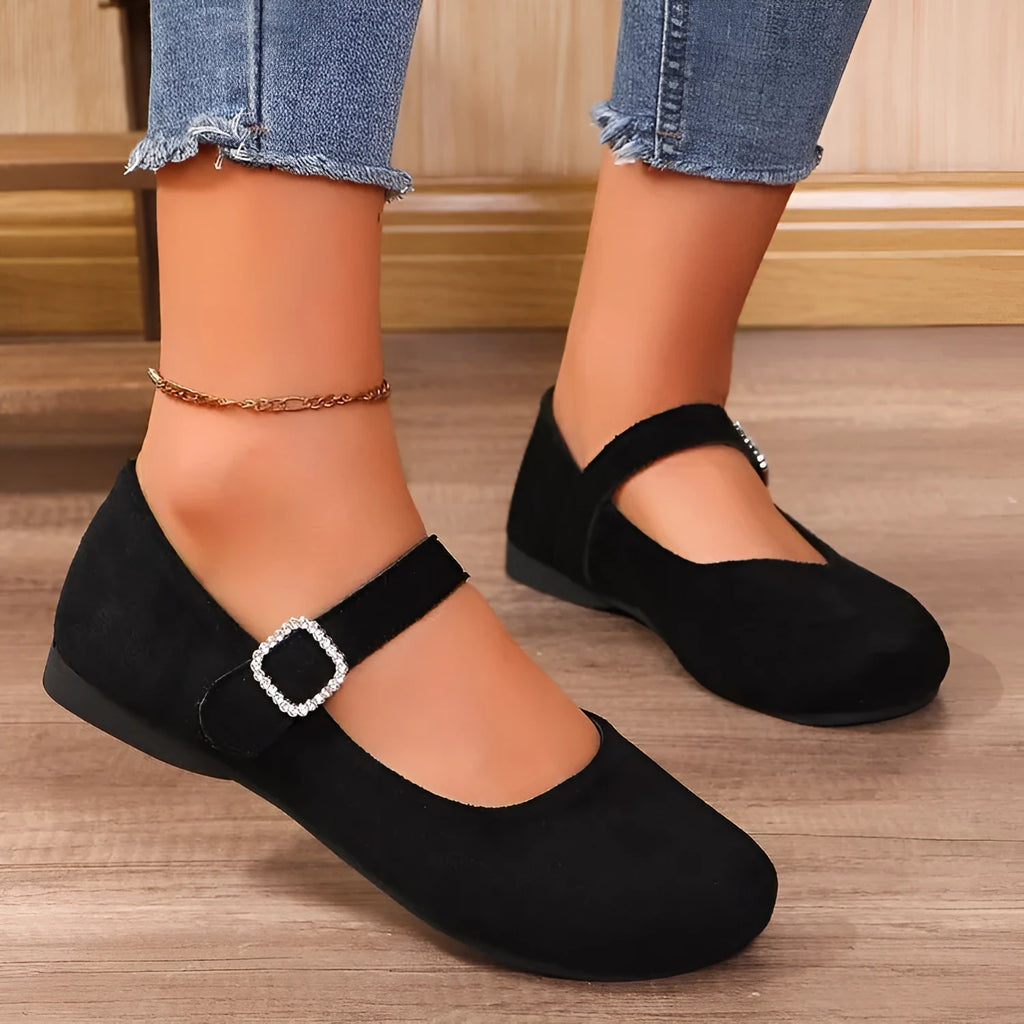 Black canvas women's fisherman shoes with rubber soles shown in low-top casual design