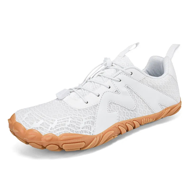 Unisex flyknit-lined climbing shoes with rubber sole in multiple colour options on a climbing hold.