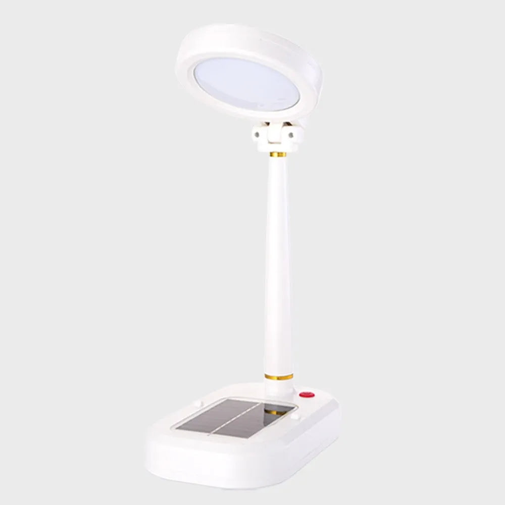 Ivory white solar charging table fan with integrated LED study lamp on a desk