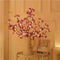 Pink fabric phalaenopsis flower on a 65 cm plastic LED branch light for bedroom decor.