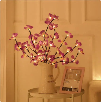 Pink fabric phalaenopsis flower on a 65 cm plastic LED branch light for bedroom decor.