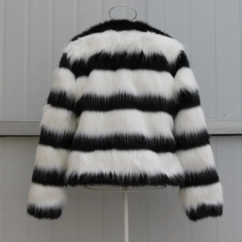 Black and white striped faux fur leather jacket for women, shown in a street fashion style.