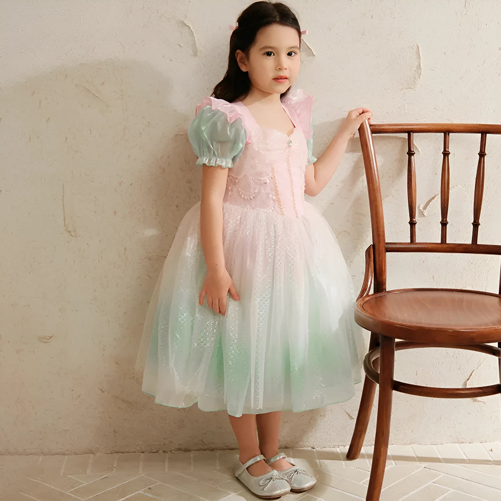 Little girl wearing a puff sleeve mermaid princess dress in cotton fabric, solid colour style, suitable for party or wedding