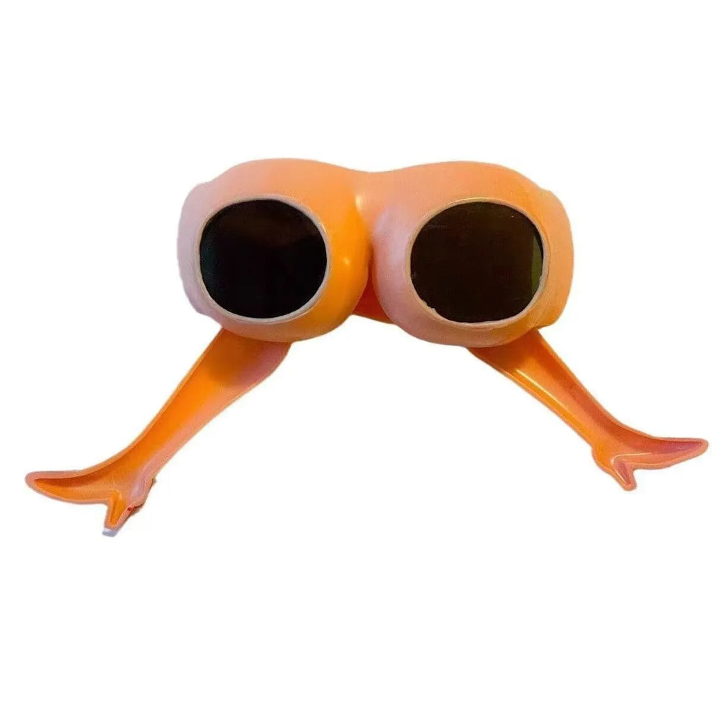 Orange plastic novelty sunglasses accessory for legs and hips on a white background.
