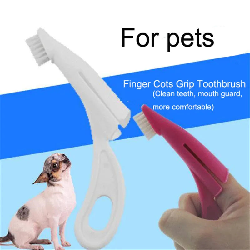 Red and white pet finger toothbrush with silicone bristles shown next to a ruler for scale.
