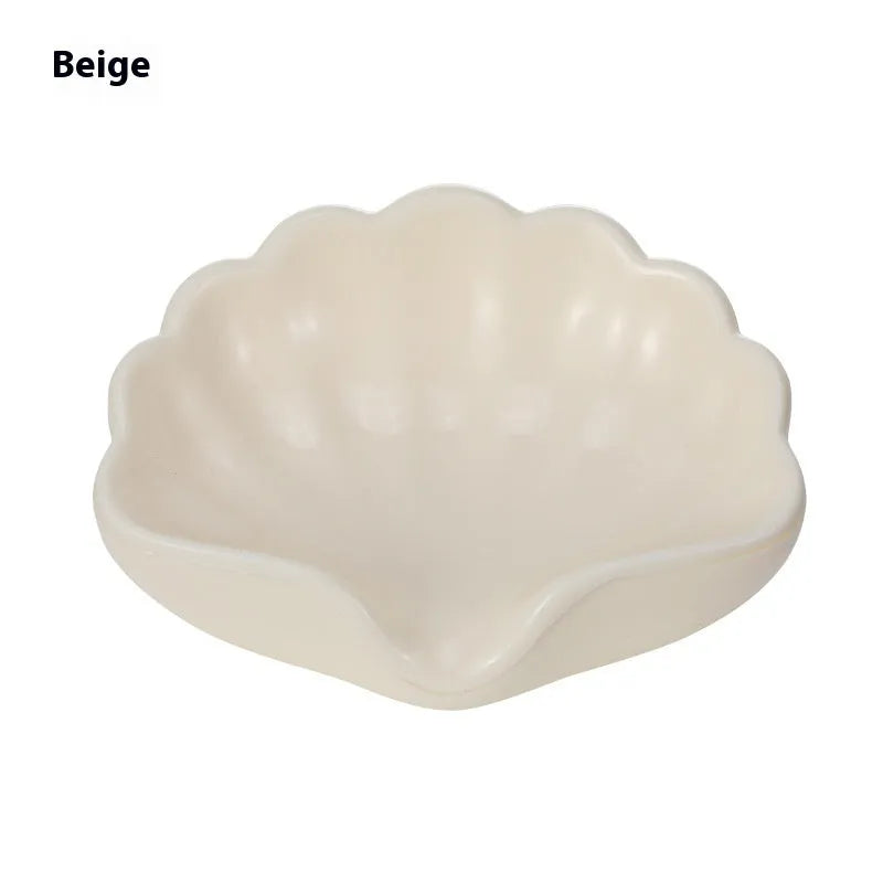 White shell-shaped plastic soap dish for bathroom countertops