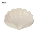 White shell-shaped plastic soap dish for bathroom countertops