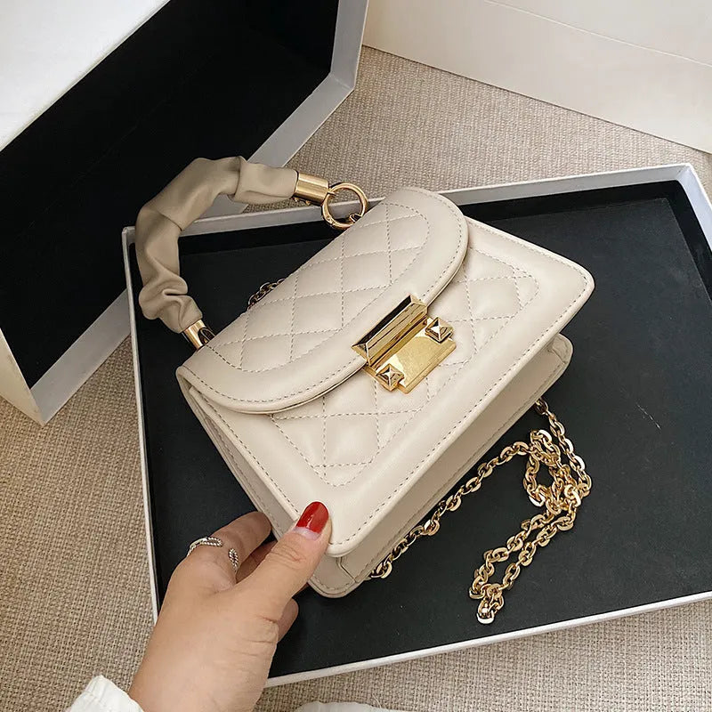 Korean-style purple square shoulder bag showing tapered 16-19cm width with crossbody strap