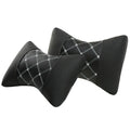 Black quilted leather car headrest pillow with diamond pattern and red stitching for neck support.