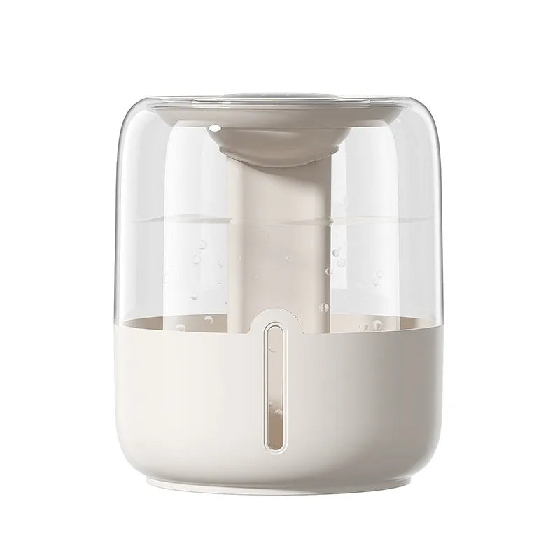 Beige round USB-powered humidifier with dual spray nozzles, display, and night light on a surface.
