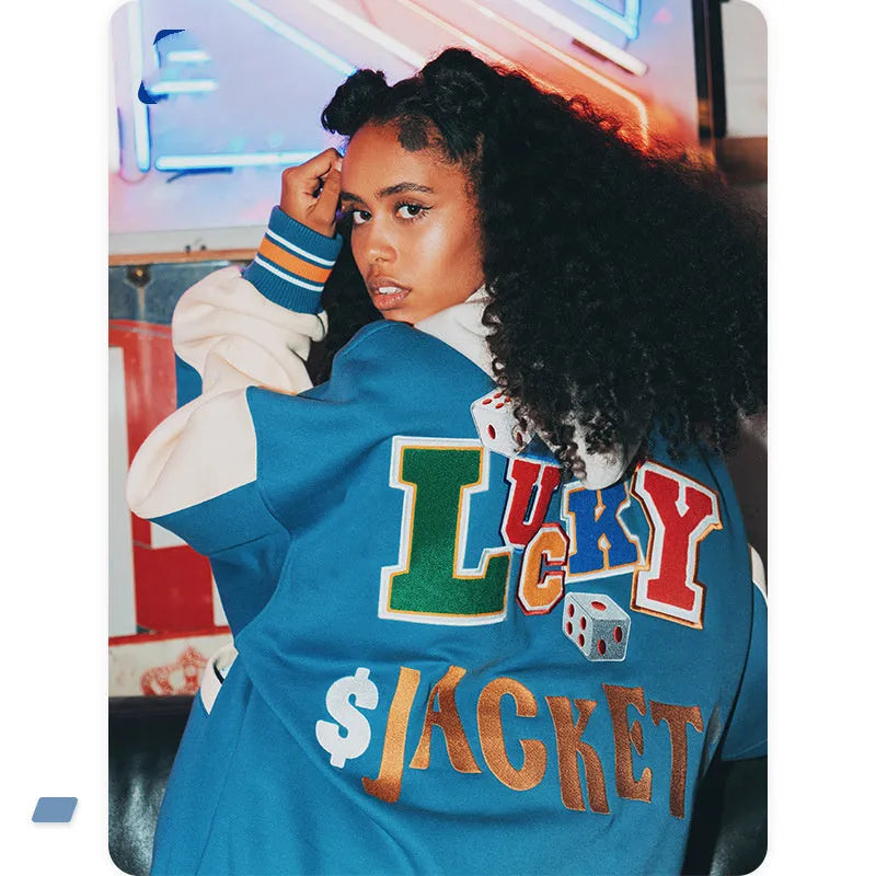 Blue varsity baseball uniform jacket with stand-up collar, single-breasted front, and loose fit, sizes S to XL