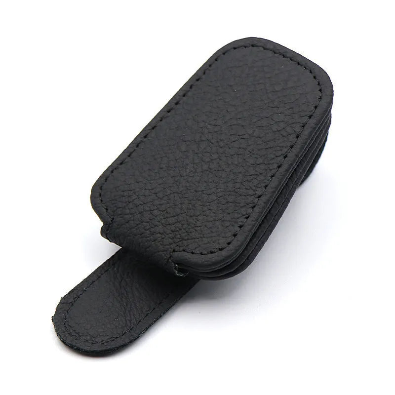 PU leather sunglasses clip holder attached to a car sun visor