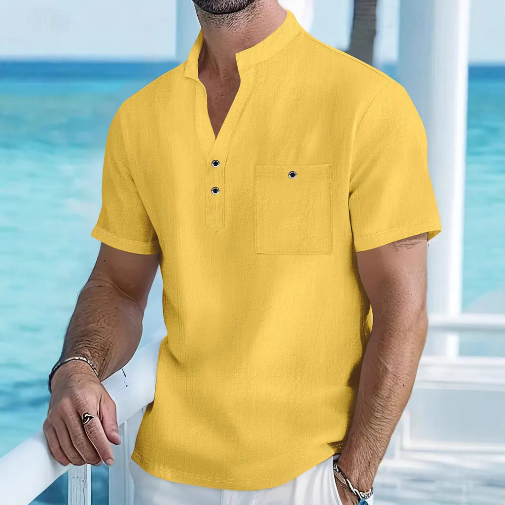 Men's loose-fit linen blend short sleeve shirt with a stand collar in a light blue colour.