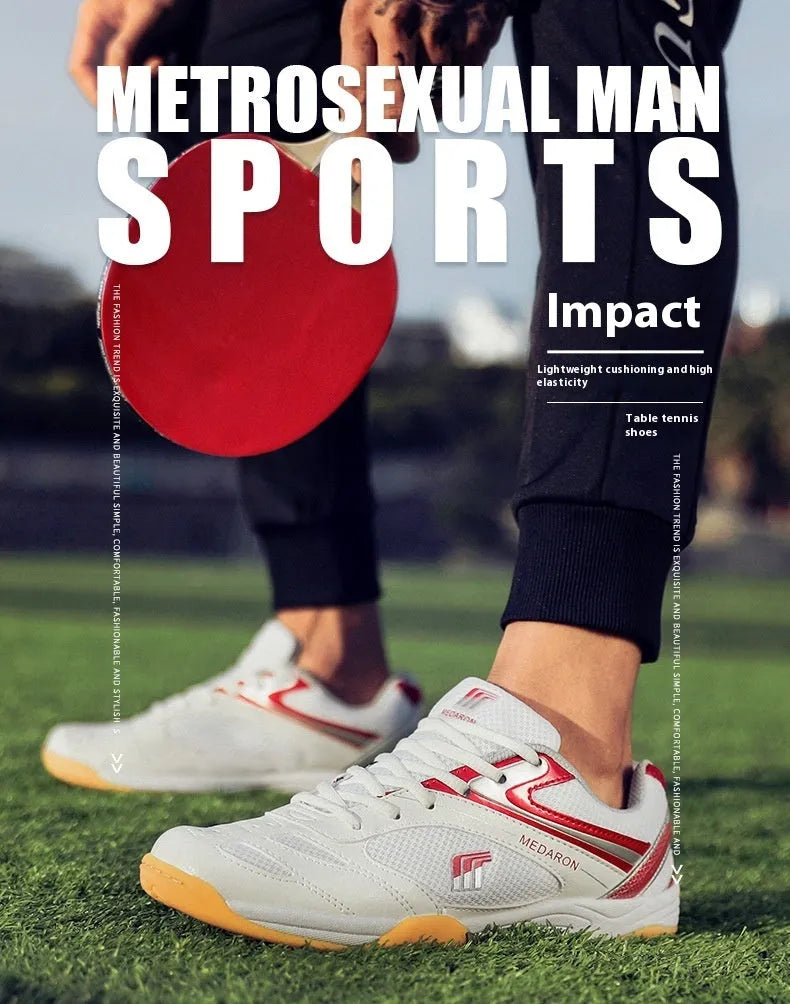 Mesh table tennis sneaker in white and red colour with lace-up front and rubber sole.