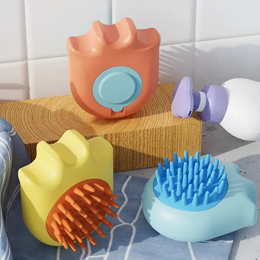Blue pet bath brush with integrated shampoo box and massage comb bristles.