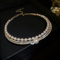 Silver-tone curved round geometric necklace for women, showcasing an exaggerated collarbone chain design.
