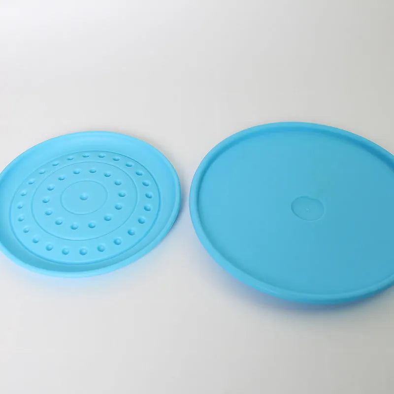 Plastic rubber disc dog toy in Green colour for outdoor fetch games with dogs