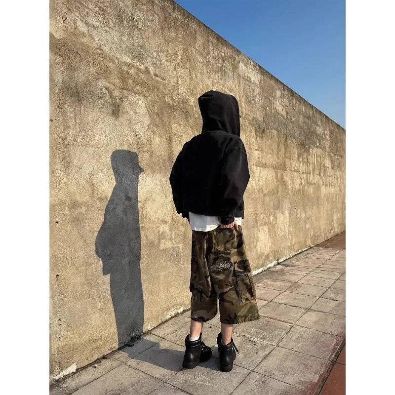 Men's camouflage cotton cropped jeans with distressed patches and straight leg