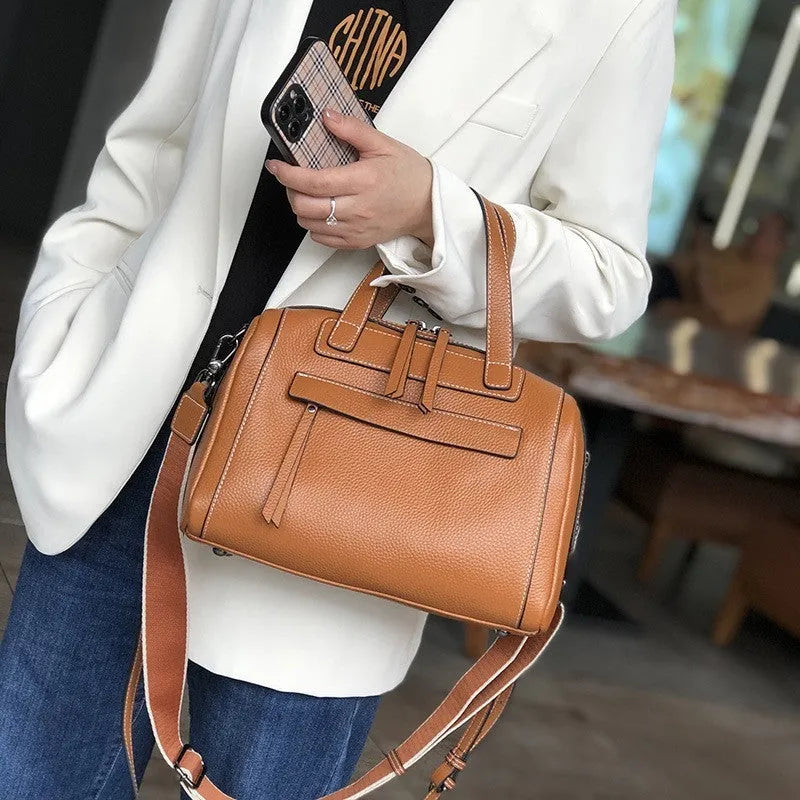 Genuine leather shoulder messenger bag with lychee pattern texture in horizontal square shape showing interior organisation compartments