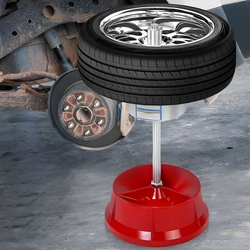 Portable aluminium hub wheel balancer with bull's eye level on an enamel base.