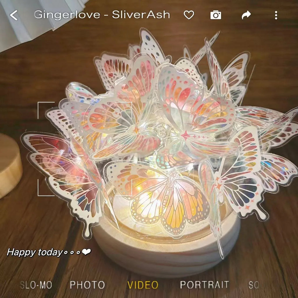 Handmade butterfly-shaped night lamp with glass shade and raw wood base, 12x15cm.