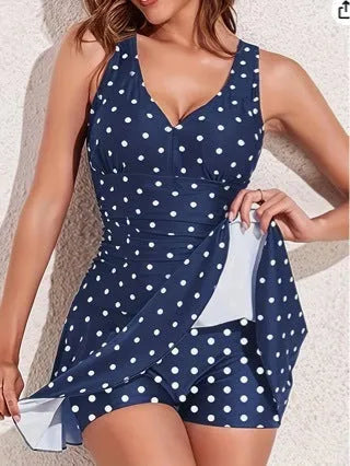 Blue polka dot print women's plus size two-piece swimsuit with bikini briefs style.