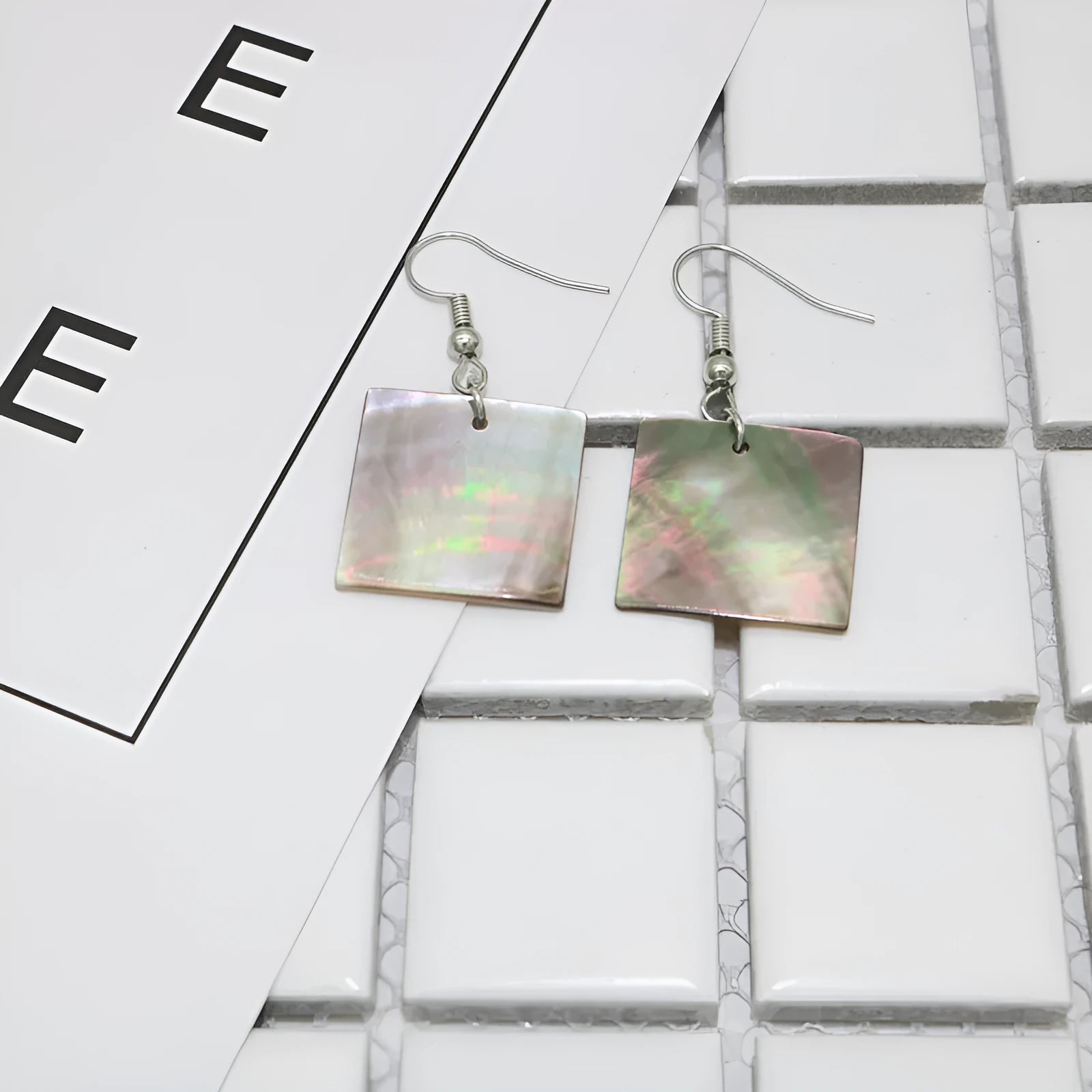 Geometric shell drop earrings in Square Panther or Rectangular Shell designs