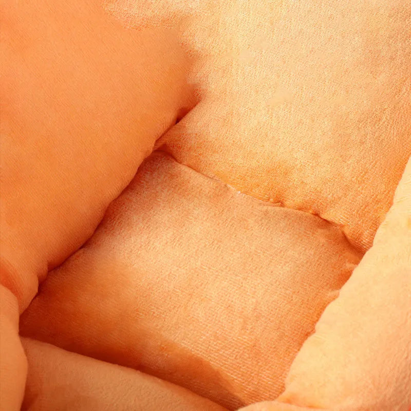 Carrot-shaped nesting dog bed with a blanket, shown in two sizes for small and medium pets.