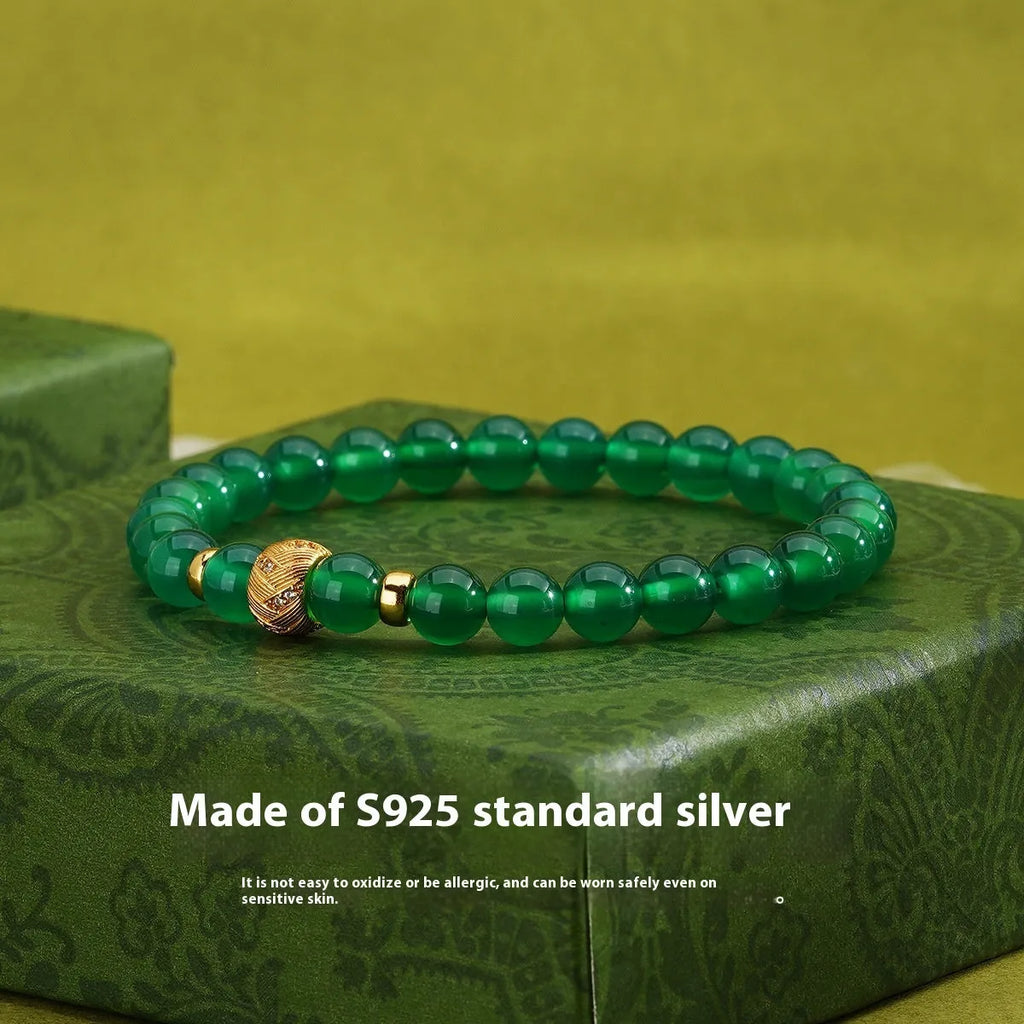 Green agate and sterling silver bracelet with geometric beads and gold electroplated details