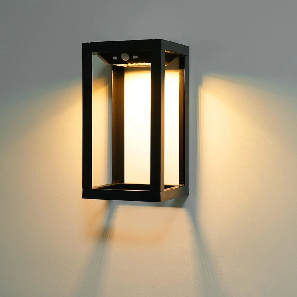 Modern Chinese style solar powered outdoor wall lamp with white plastic housing for garden courtyard lighting.