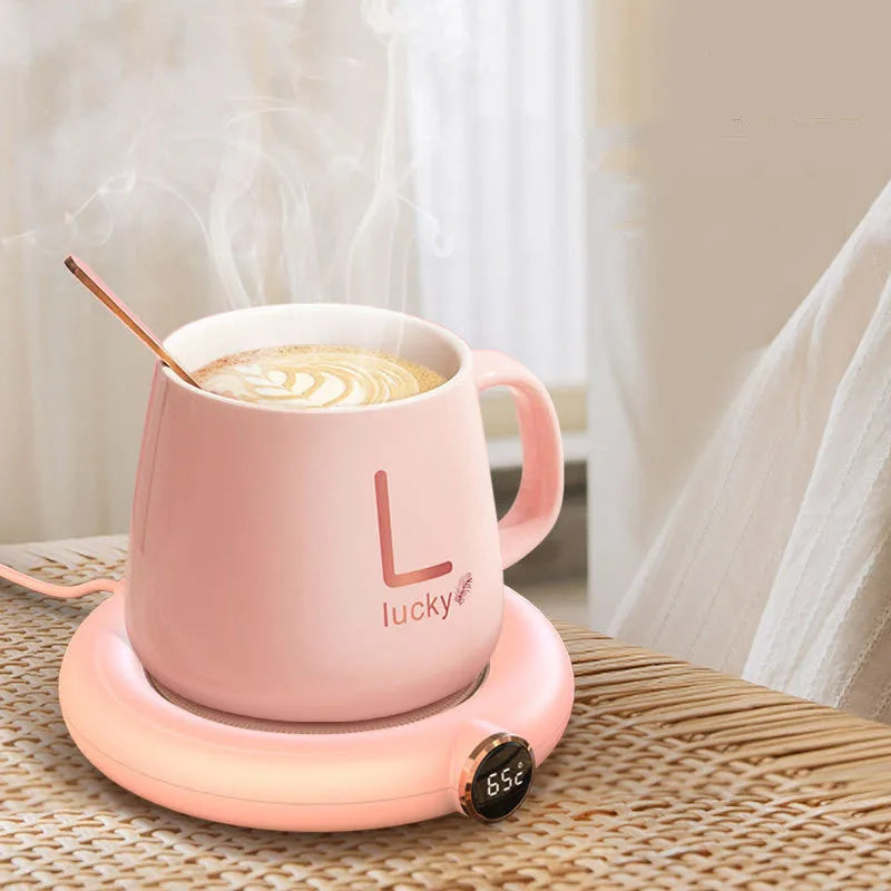 White USB coffee mug warmer coaster with dimensions 130x110x23mm on wooden desk
