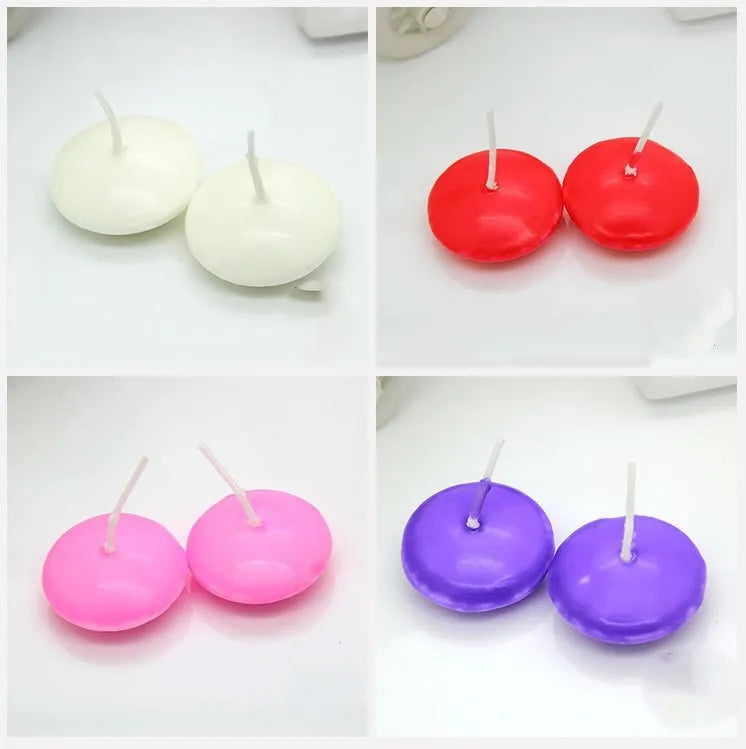 Pack of 10 floating candles in ivory white, red, pink, pure white, and yellow, cylindrical paraffin wax