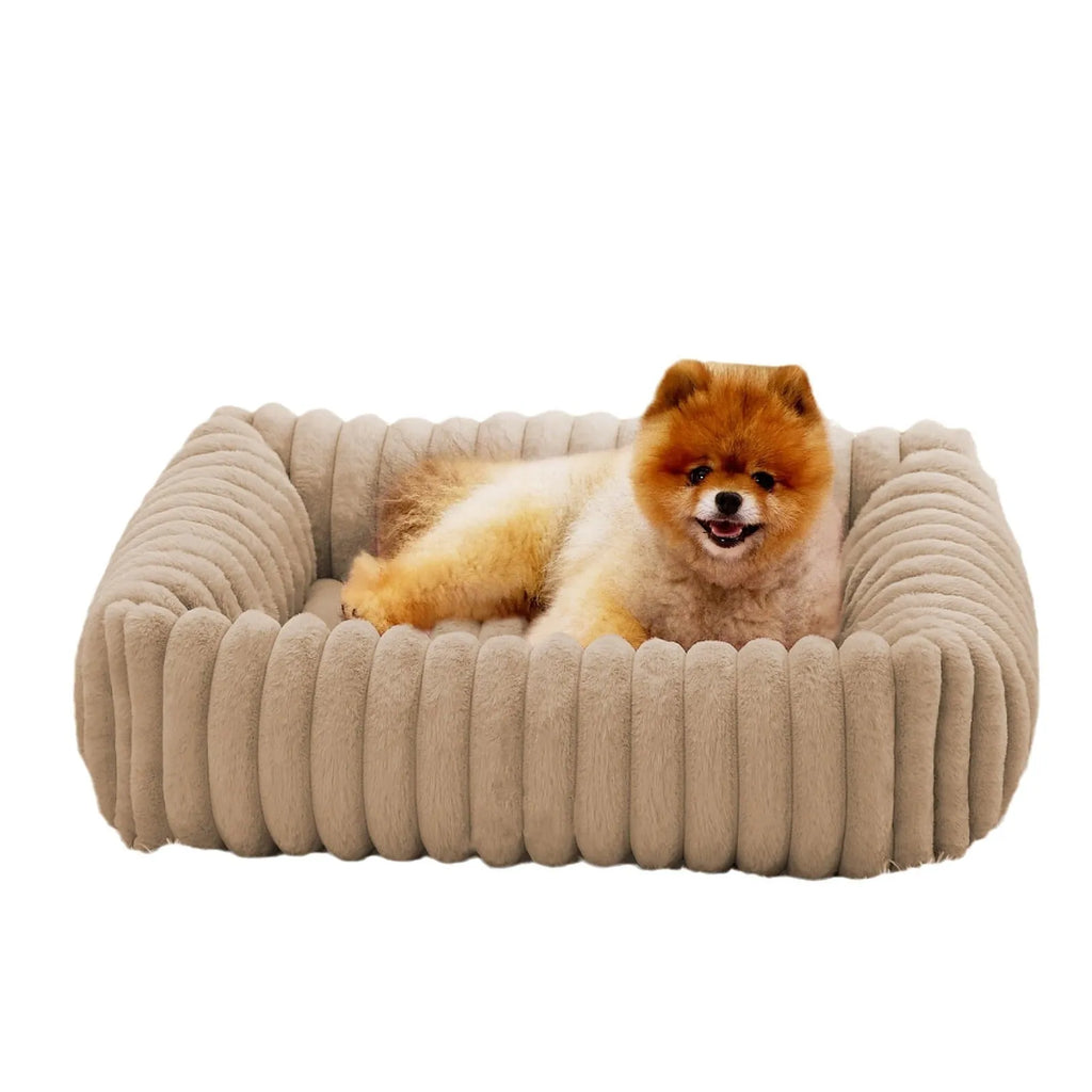 Soft winter dog bed cushion in beige colour showing raised sides and plush sleeping surface