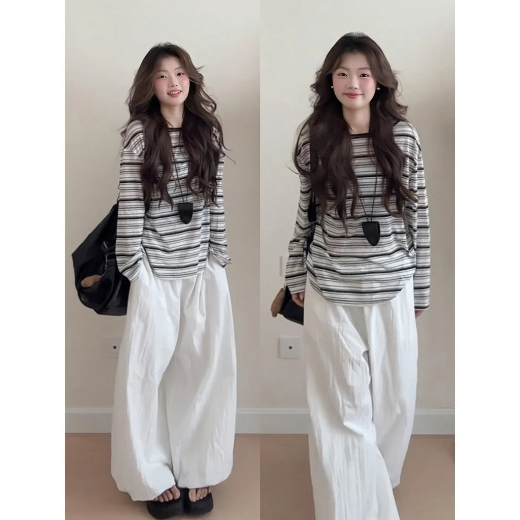 Black stripes long sleeve relaxed fit polyester T-shirt with sun protection, front view