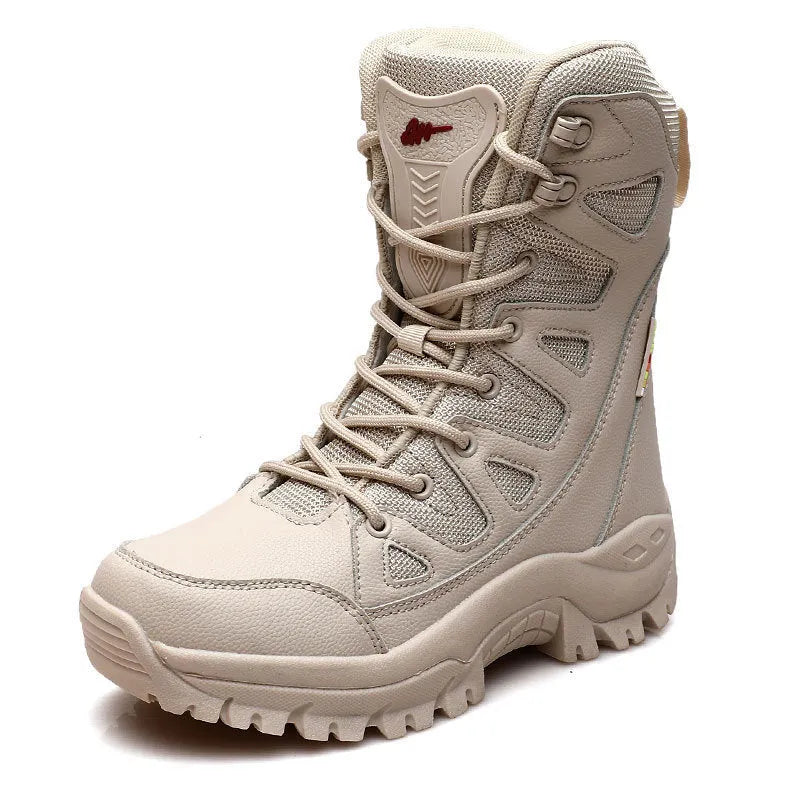 Beige cowhide leather hi-top hiking shoes on a rocky outdoor trail