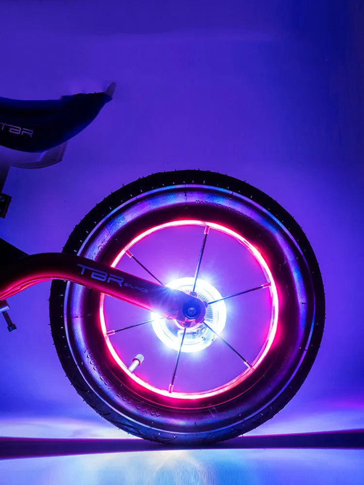 ABS balance bike wheel light with USB charging, fits hubs up to 3cm, includes rubber gaskets