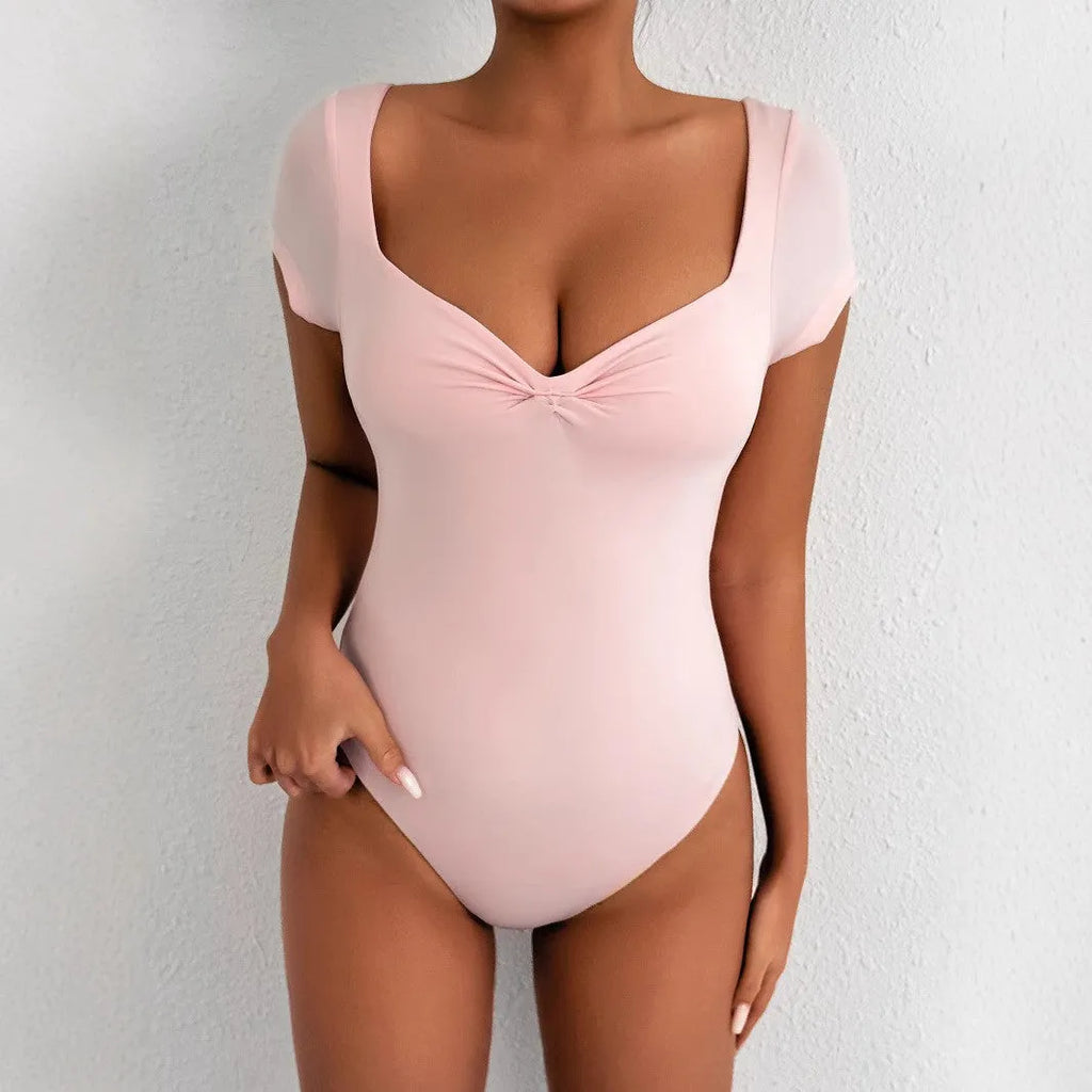 Light pink V-neck short sleeve bodysuit, slim fit, 65cm mid-length, pullover style, women's commuting jumpsuit.