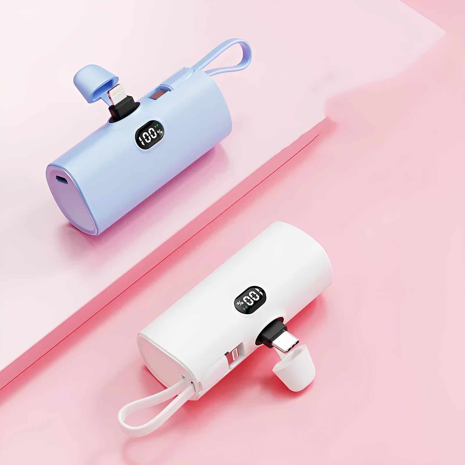 Compact capsule‑shaped digital display power bank with integrated plug, shown in multiple colours.