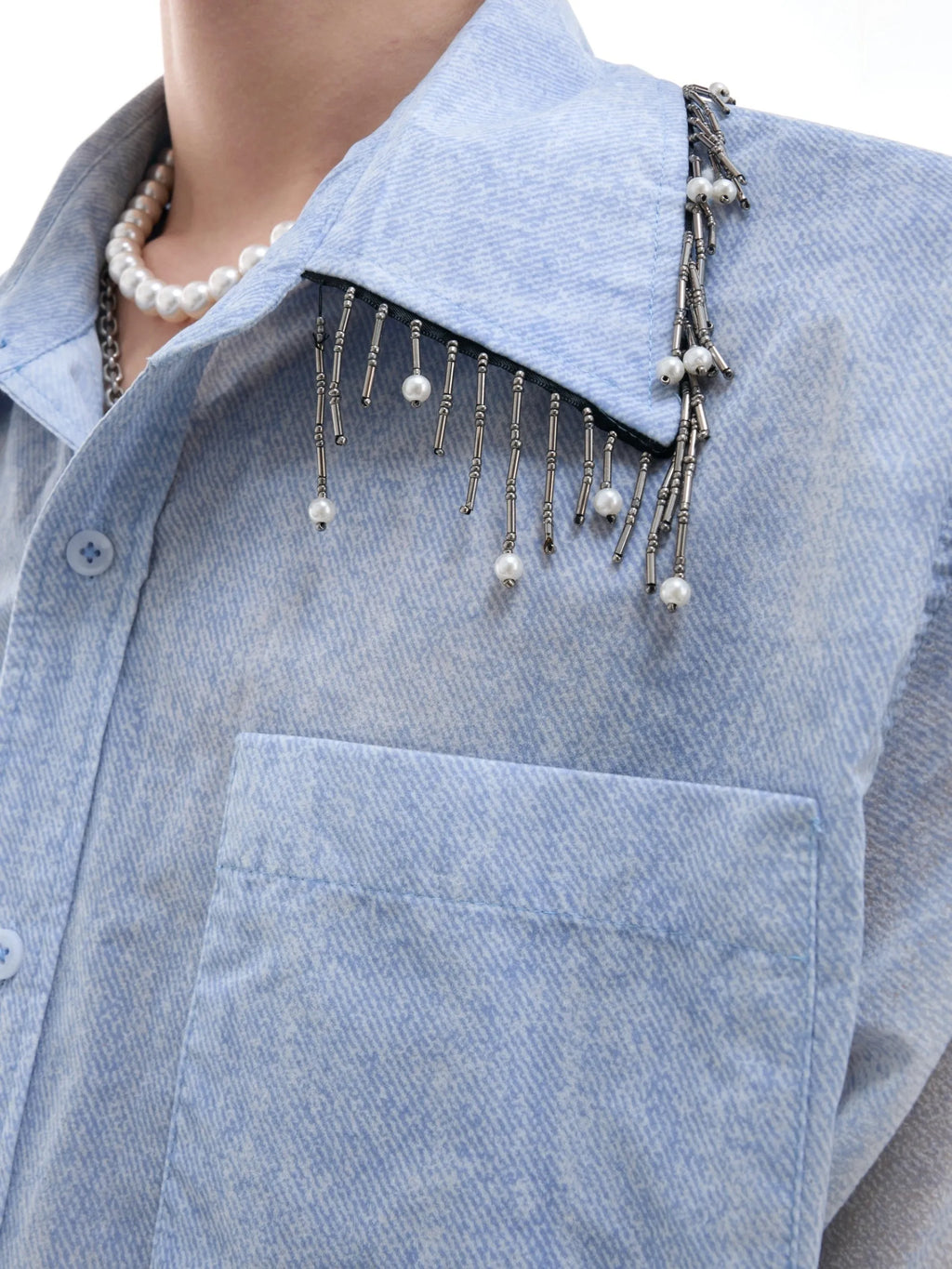 Men's blue and white gradient loose-fit short sleeve summer shirt on a hanger.