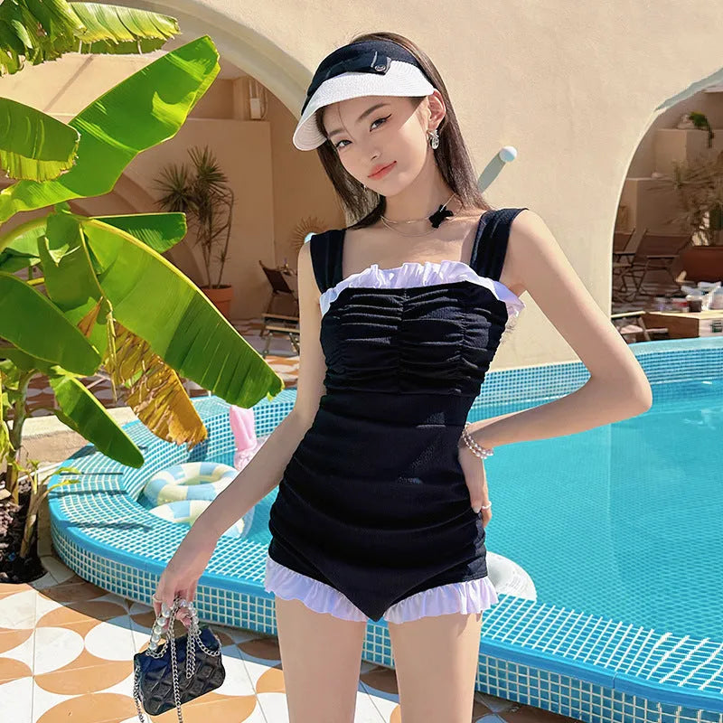 Women's black one-piece swimsuit jumpsuit with suspender straps for swimming