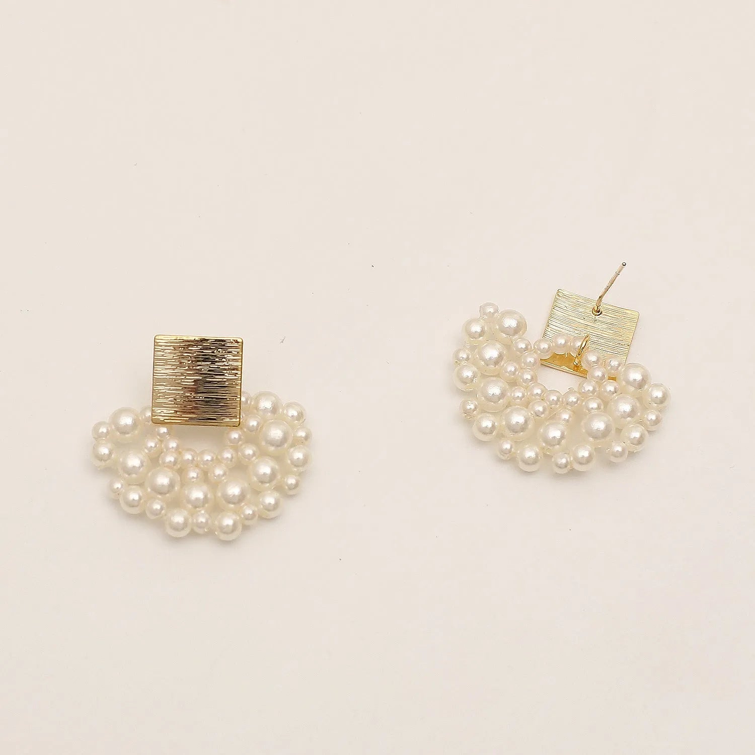Handmade pearl woven scalloped stud earrings in 14K true gold electroplated alloy with inlaid pearls