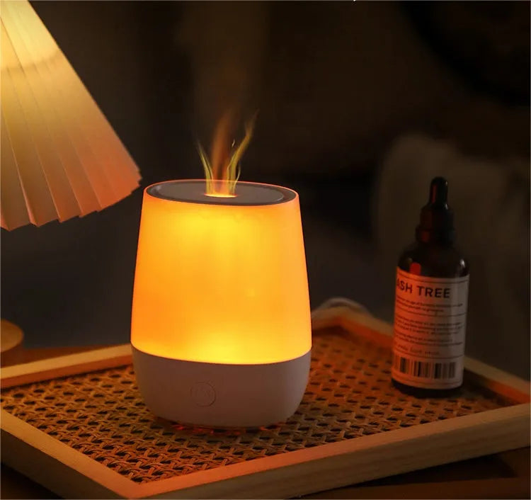White flame effect aromatherapy diffuser humidifier with USB-C port on desk