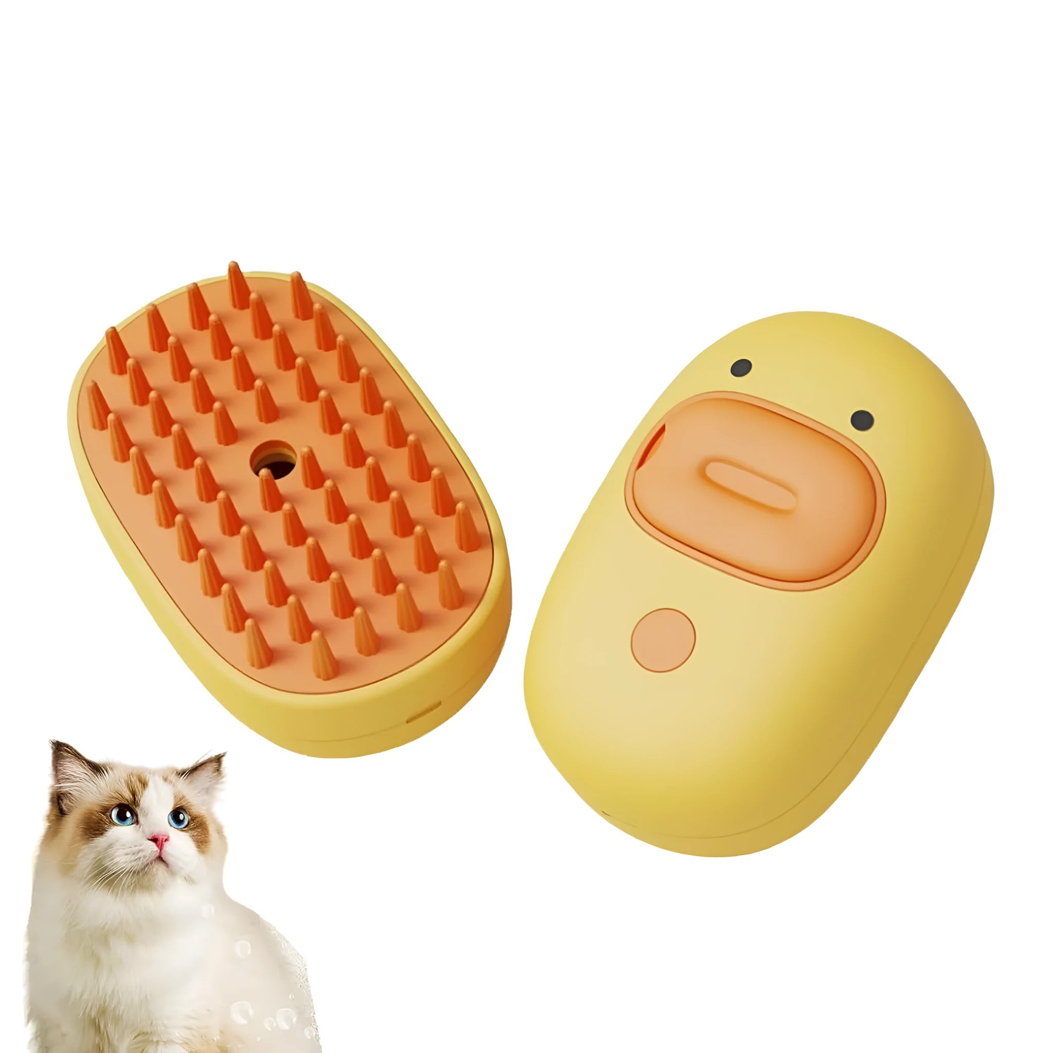 White rechargeable silicone steam brush for grooming dogs and cats on a table.