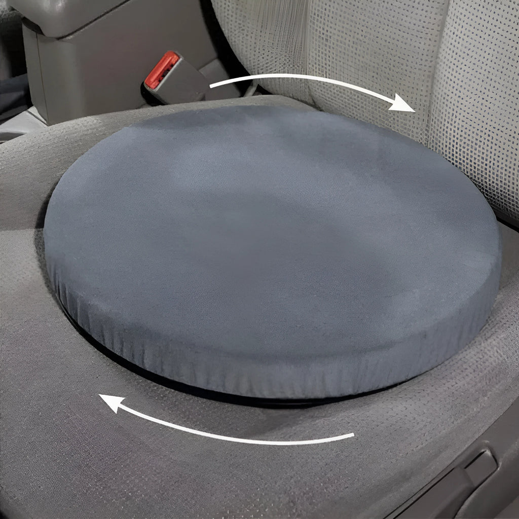 Grey rotating car seat cushion with plush fabric on a car seat, showing swivel function.