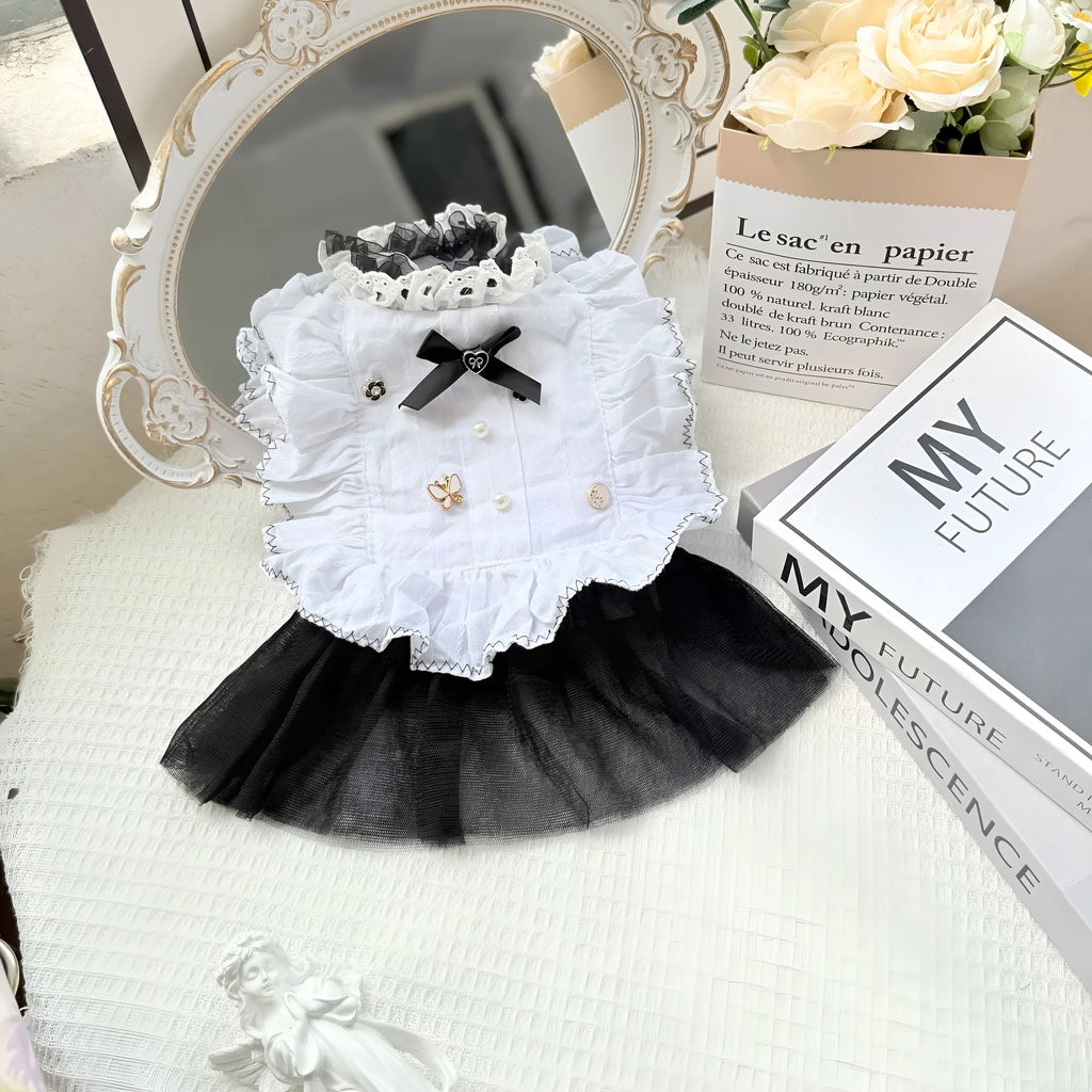 White polyester princess-style dog dress with a gauze skirt for small dogs.