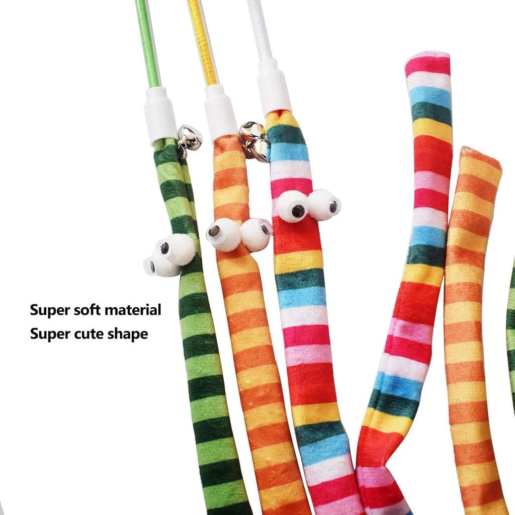 Cat wand toy with polycarbonate handle and long plush strip in vibrant colours, shown with bell attachment.