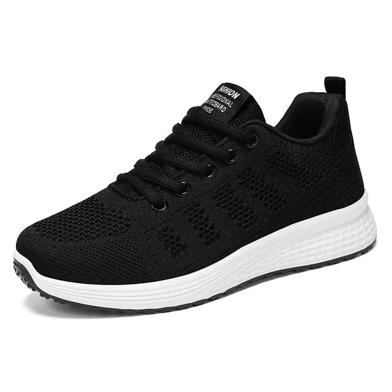 Women's flyknit running shoes in black with lace-up front and round toe design