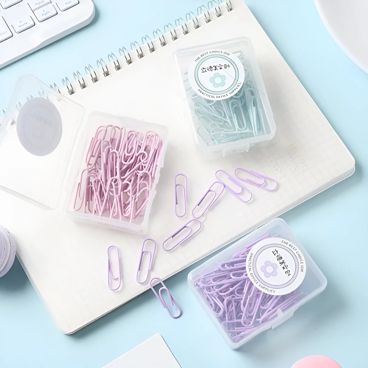Macaron colour alloy paper clips in pink, purple, and green, 50mm large and 28mm small sizes.