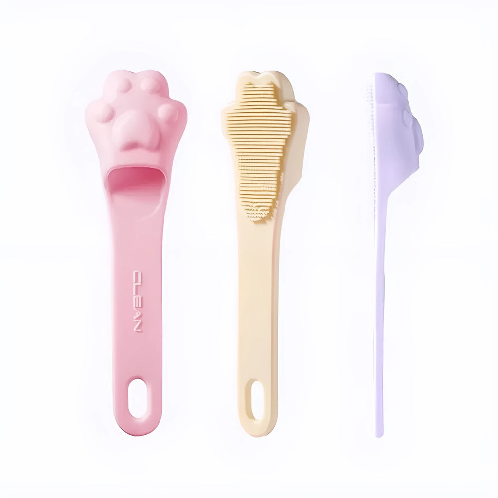 Silicone finger cover toothbrush for dogs and cats in pink, purple, yellow, and white.