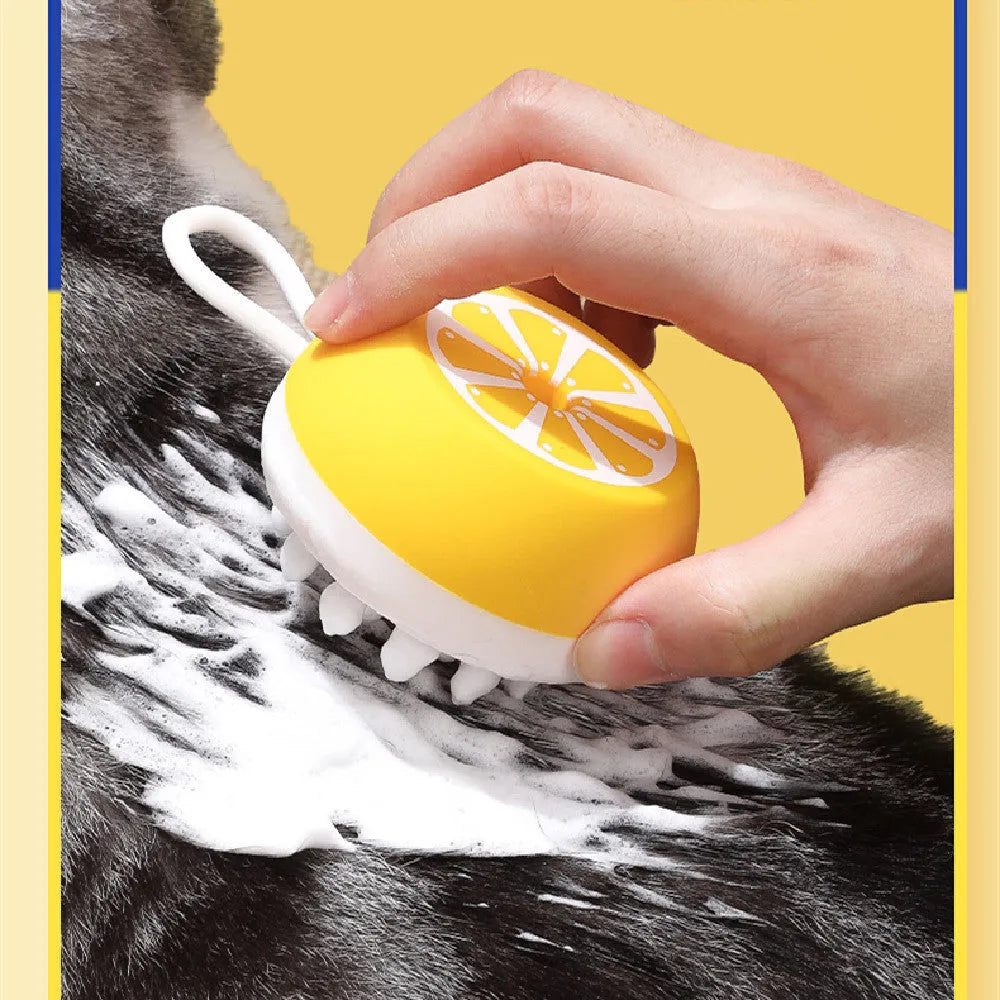 Yellow silicone pet bath brush with massage comb for dog and cat grooming measuring 102mm